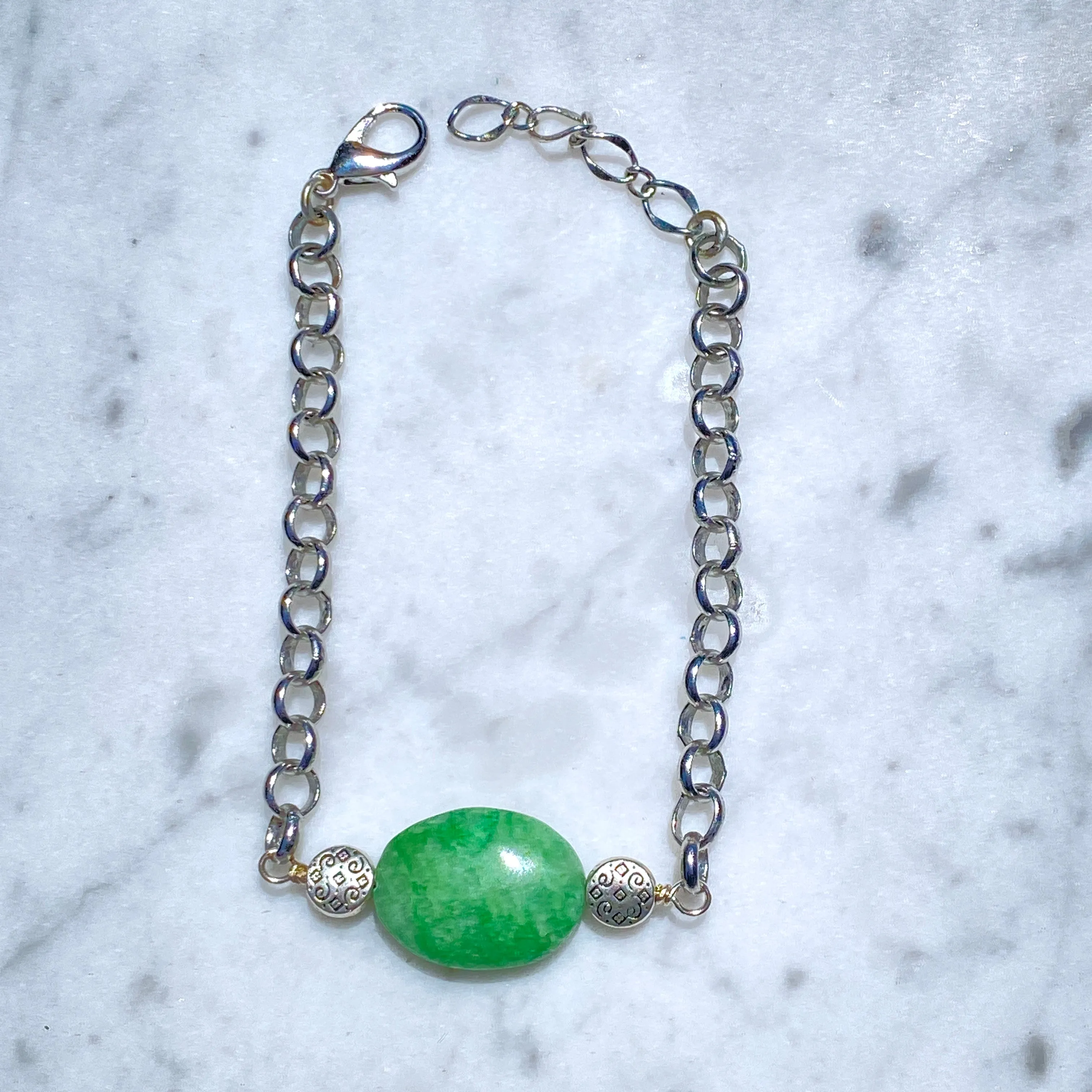 Genuine Emerald gemstone bracelet with silver chain.