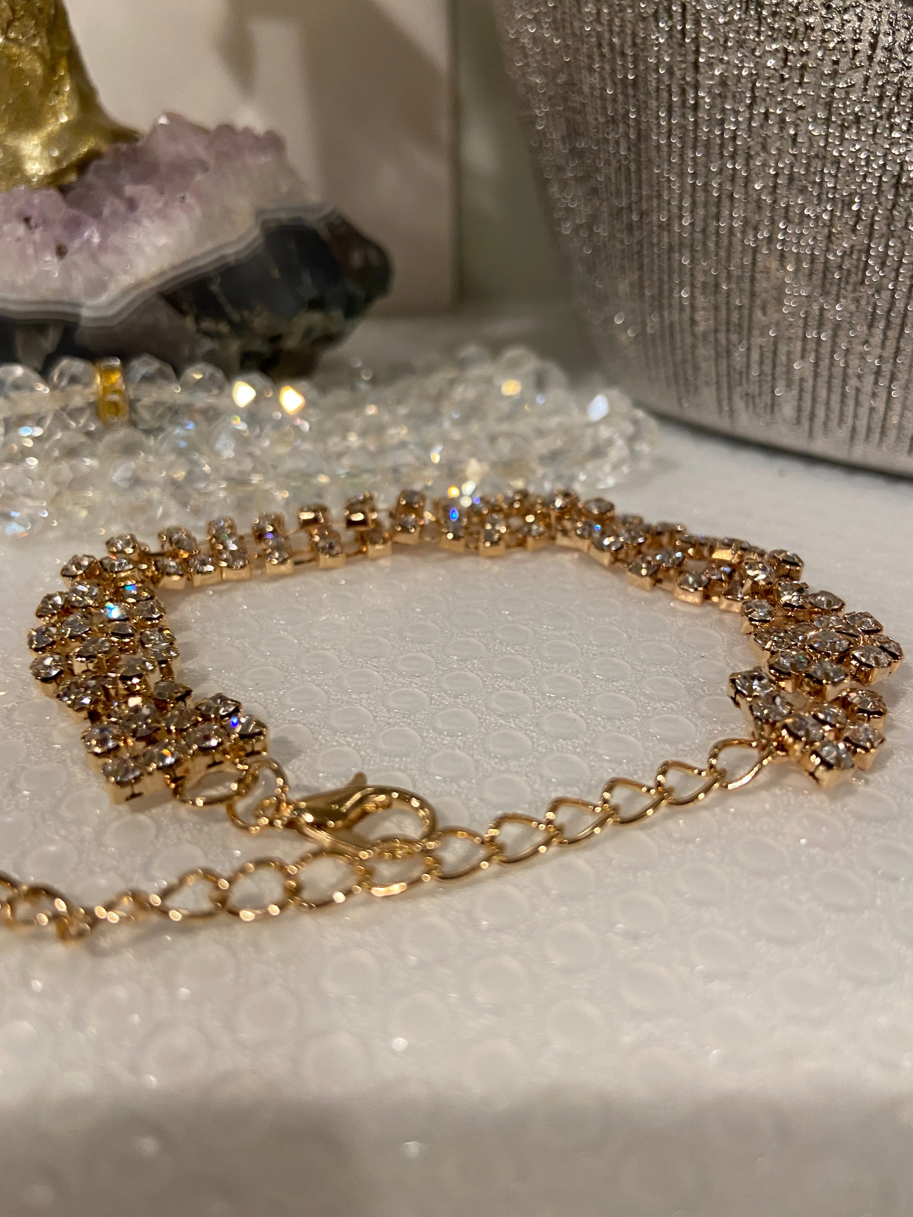 Luxurious Sparkling golden Bracelet with shiny Crystals.