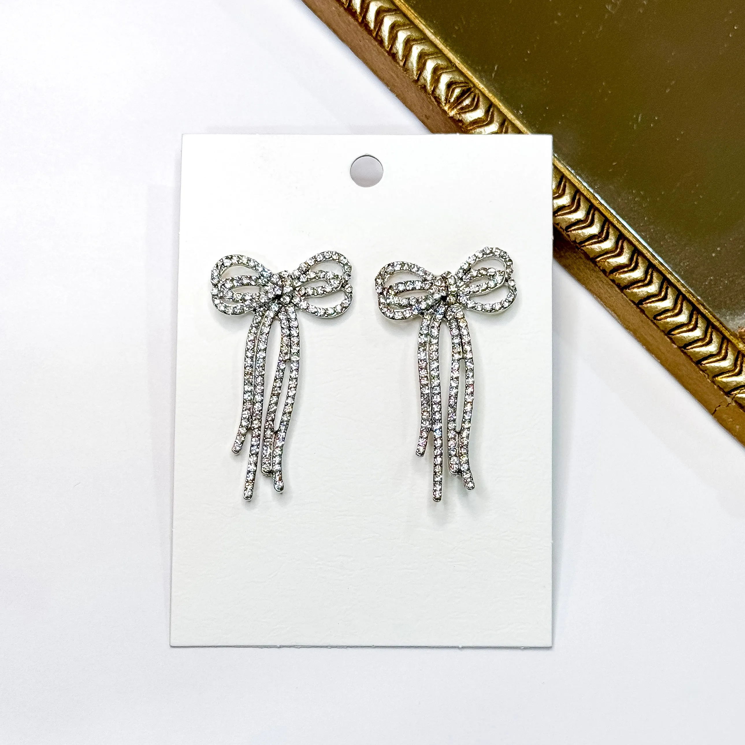 Radiant Ribbons Silver Tone Clear Rhinestone Bow Earrings